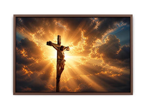 Jesus on the cross illuminated by heavenly golden light with dramatic clouds Christian wall art canvas print