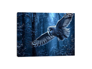 Owl in flight canvas art with misty blue forest for serene bedroom decor.