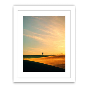 Lone figure desert canvas art with surreal warm tones for modern hallway decor.