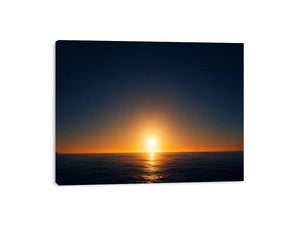 Dark ocean sunset canvas art with golden horizon for modern living room decor.