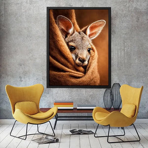 Baby kangaroo canvas art in warm earthy tones for cozy nursery decor.