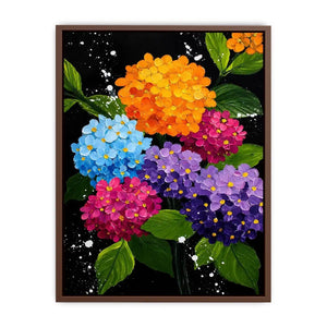 Colorful hydrangea bouquet canvas print with orange blue pink purple flowers green leaves black background and paint splatter details