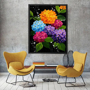 Colorful hydrangea bouquet canvas print with orange blue pink purple flowers green leaves black background and paint splatter details