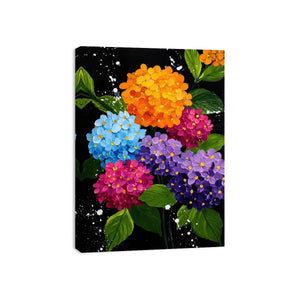 Colorful hydrangea bouquet canvas print with orange blue pink purple flowers green leaves black background and paint splatter details