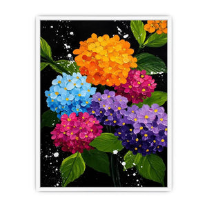 Colorful hydrangea bouquet canvas print with orange blue pink purple flowers green leaves black background and paint splatter details