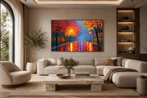 Autumn pathway canvas art with glowing lamps and wet reflections for warm living room decor.