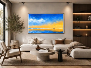 abstract beach canvas art with blue sky and golden sand for coastal living room decor.