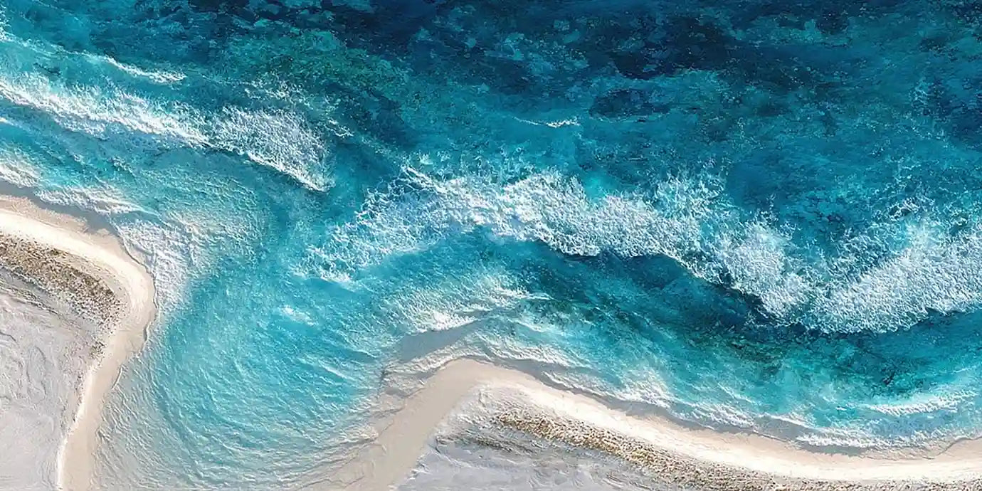 Aerial ocean shoreline canvas art for modern coastal living room decor.