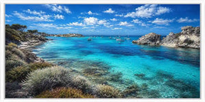 Bright turquoise cove canvas art with boats for beach house living room decor.