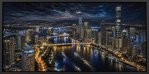 Night city skyline canvas art with bridge, river lights and dramatic reflections.