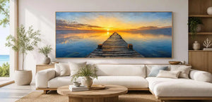 Sunset pier canvas print with calm water, wooden jetty and glowing horizon.