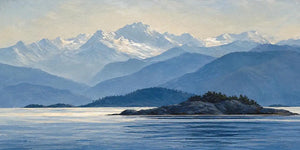 Blue mountain lake canvas art with island, snowy peaks and peaceful water.