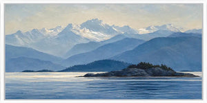 Blue mountain lake canvas art with island, snowy peaks and peaceful water.