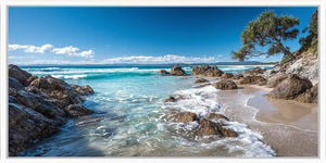 Tropical beach canvas art with pandanus tree and ocean waves for coastal decor.