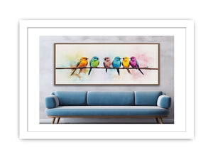 Colorful watercolor bird canvas art above sofa for cheerful decor.