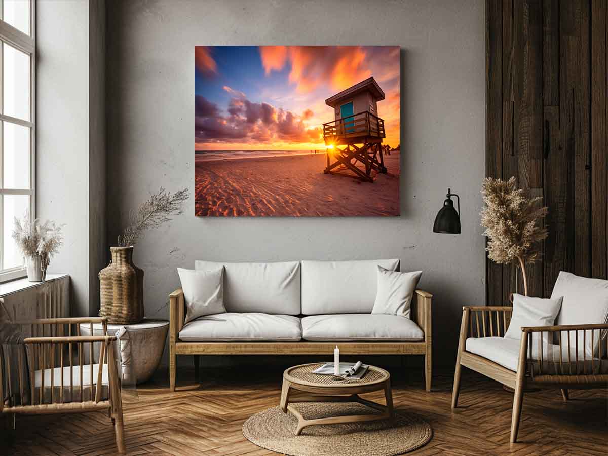Beach sunset lifeguard wall art with warm sky for coastal bedroom decor.