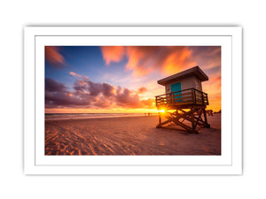 Beach sunset lifeguard wall art with warm sky for coastal bedroom decor.