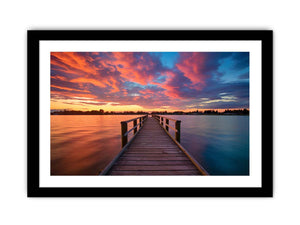 Dramatic sunset pier canvas art for coastal living room and bedroom decor.
