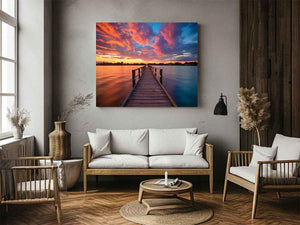 Dramatic sunset pier canvas art for coastal living room and bedroom decor.