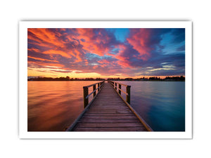 Dramatic sunset pier canvas art for coastal living room and bedroom decor.