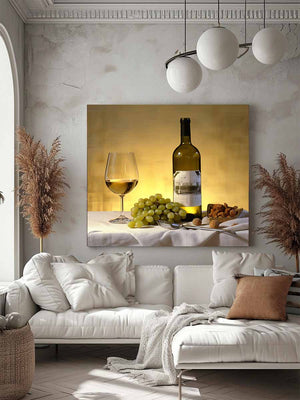White wine bottle grapes and glass still life for dining room decor.