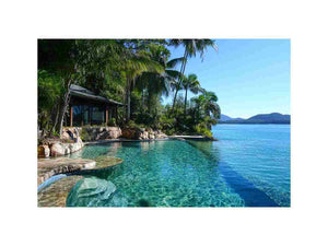Tropical lagoon pool photograph for luxury coastal living room decor.