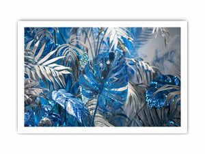 Blue tropical leaf canvas art with silver palm foliage for glamorous modern wall decor.