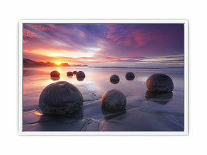 Coastal sunset boulder canvas print for serene beach house or living room decor.