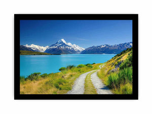 Alpine Lake Path canvas art featuring turquoise alpine lake, path and snow mountains for modern living room decor.