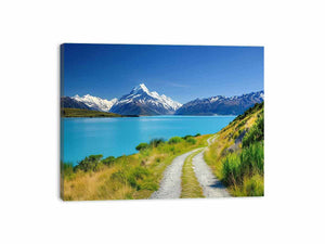 Alpine Lake Path canvas art featuring turquoise alpine lake, path and snow mountains for modern living room decor.