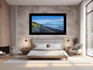 Black Sand Horizon canvas art featuring black sand beach, ocean and distant mountain for modern living room decor.