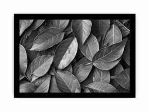 Black and white botanical leaves canvas art for calm modern bedroom decor.