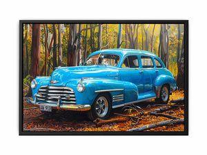 Blue vintage car canvas art in forest setting for office or man cave decor.
