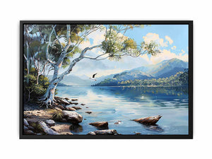 Blue lake landscape canvas art with mountains, trees, and birds for serene living room decor.