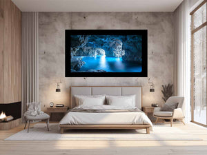 Blue sea cave wall art with turquoise water for coastal home decor.