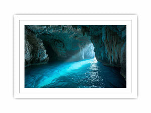 Turquoise sea cave photography canvas art for modern coastal living room decor.