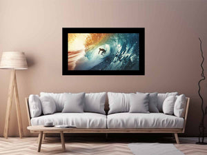 Dramatic surfer inside blue ocean wave canvas for modern coastal living room decor.