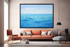 Bright blue ocean canvas art with soft waves for coastal bedroom or living room decor.
