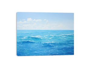 Bright blue ocean canvas art with soft waves for coastal bedroom or living room decor.