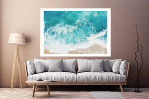 Aerial ocean wave canvas print for bright coastal living room decor.