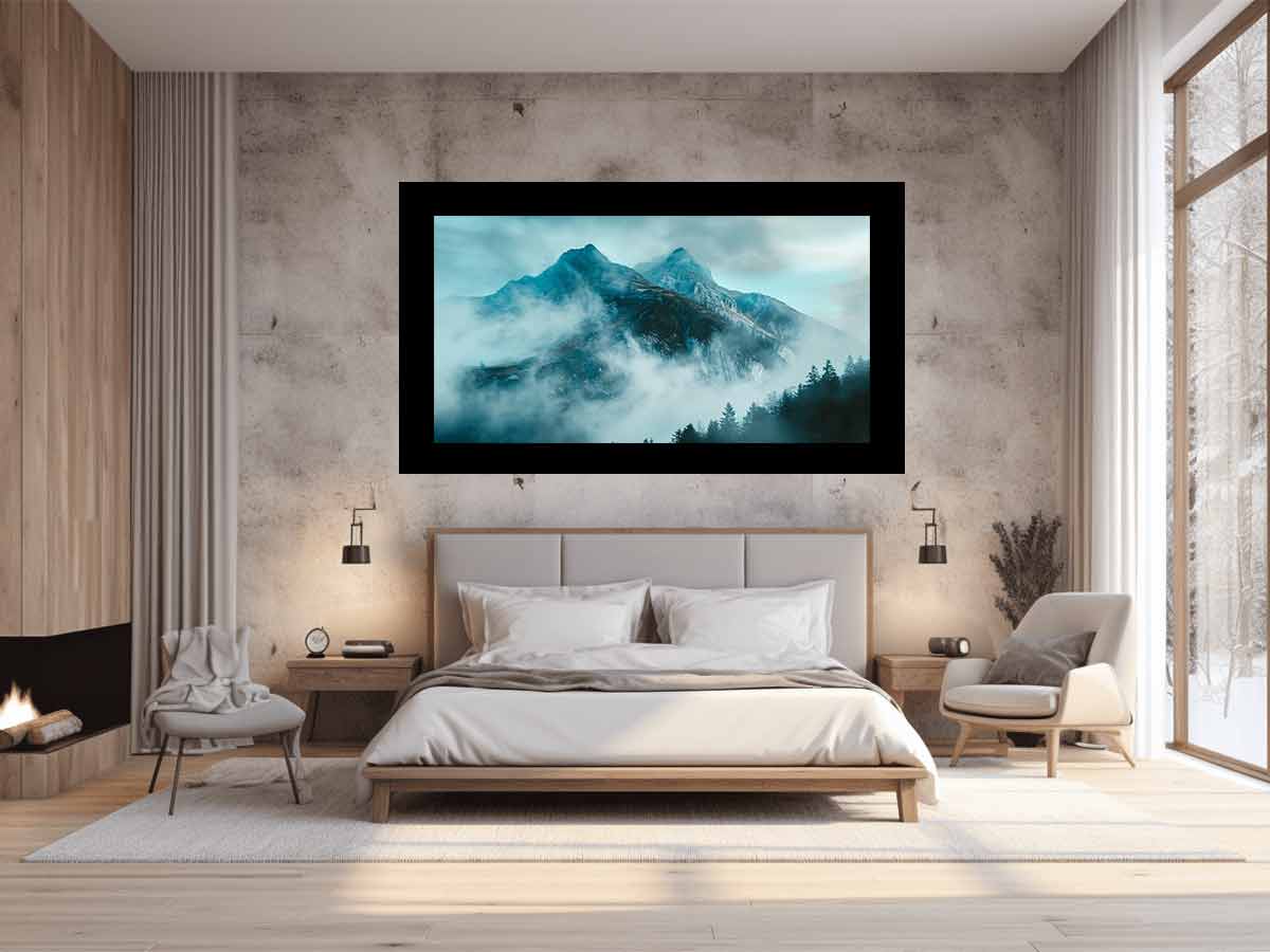 Misty blue mountain canvas art with fog and evergreen trees for modern living room decor.