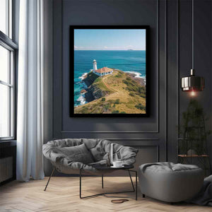 Coastal lighthouse canvas art with turquoise ocean for beach house living room decor.