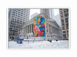 City architecture canvas print with colorful mural on snowy building for modern office decor.