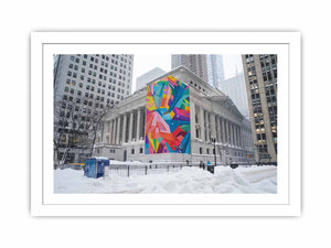 City architecture canvas print with colorful mural on snowy building for modern office decor.