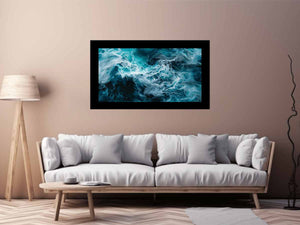 Ocean foam abstract canvas art in teal and white for coastal modern living room decor.