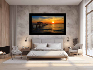 Golden sunset pier canvas print with ocean and gazebo for warm coastal living room decor.