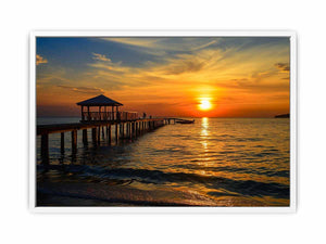 Golden sunset pier canvas print with ocean and gazebo for warm coastal living room decor.