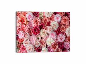 Pink floral canvas print with roses and layered blossoms for elegant bedroom wall decor.
