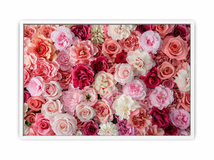 Pink floral canvas print with roses and layered blossoms for elegant bedroom wall decor.