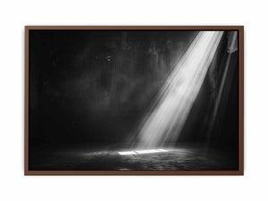 Dramatic black and white light beam entering a dark industrial room for modern living rooms decor.